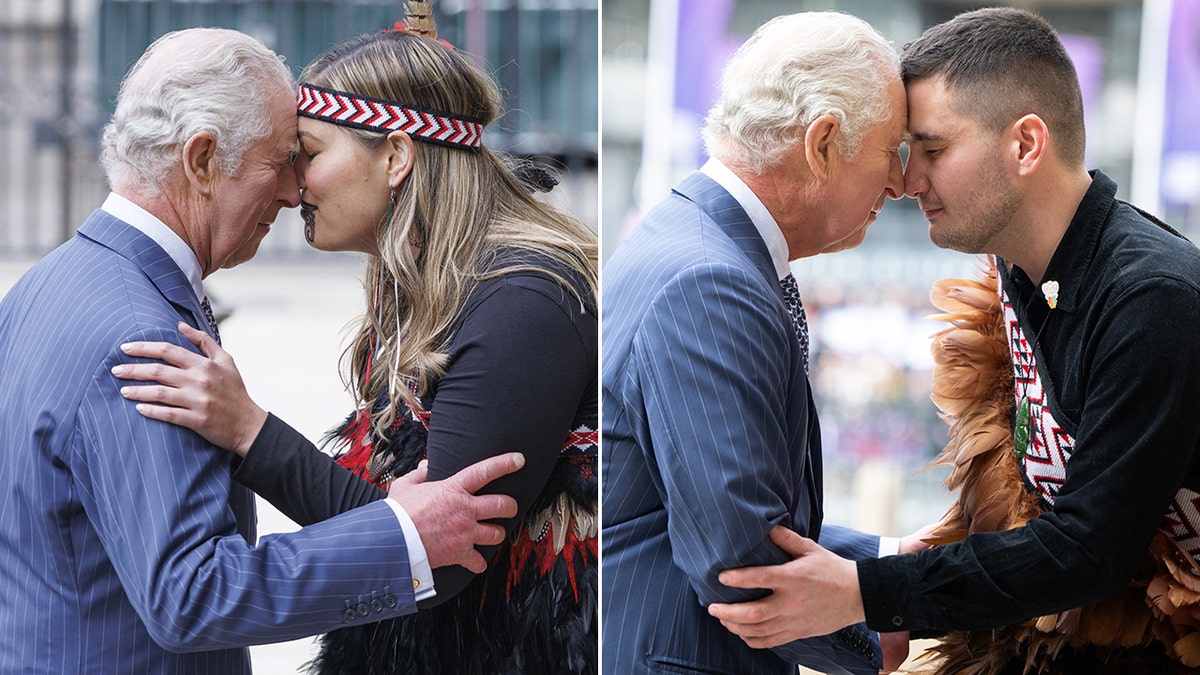 King Charles holds the arms of a female outside Westminster Abbey as he performs the Hongi, a traditional Maori greeting where you touch noses, split King Charles performs the greetin with a man