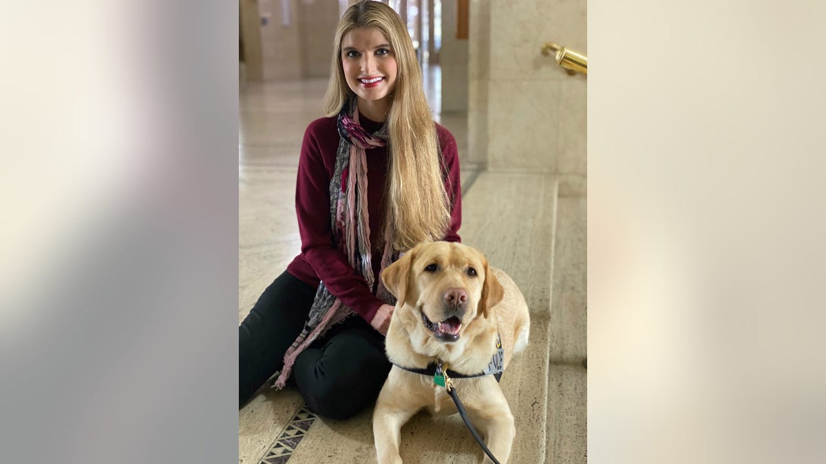 Alicia Kozak with dog