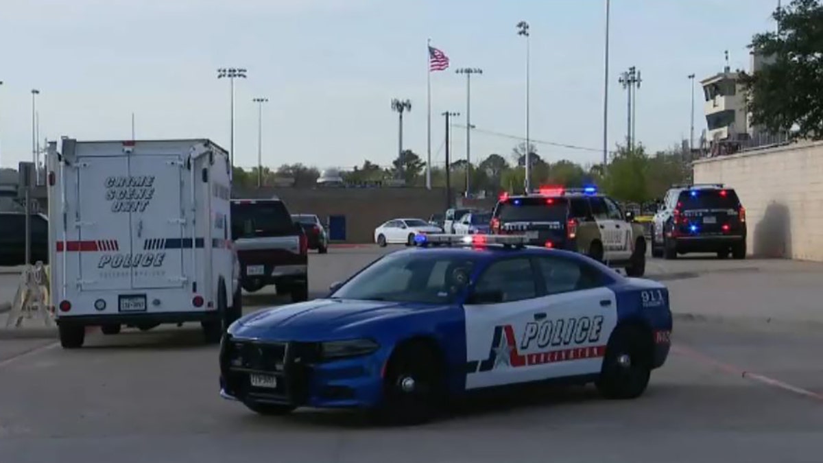 police cars outside Lamar High School