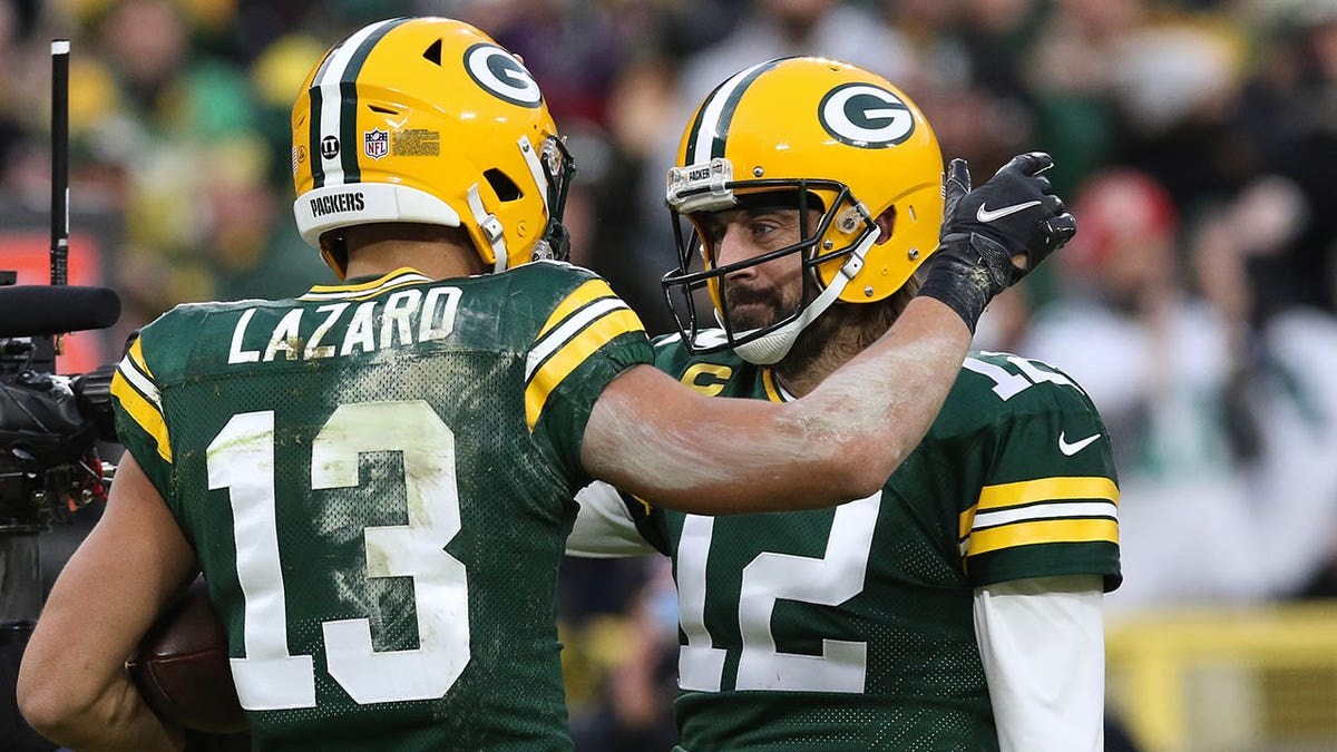 Lazard and Rodgers celebrate