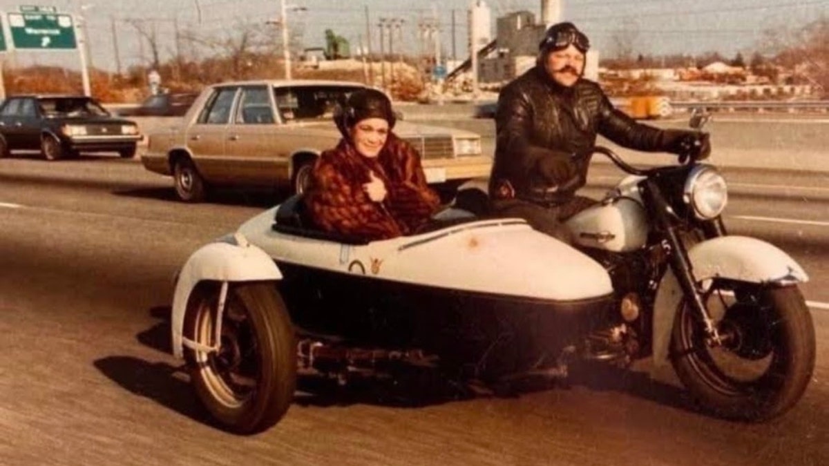 Lori Lee Malloy and the love of her life, Pirate, on a motorcycle