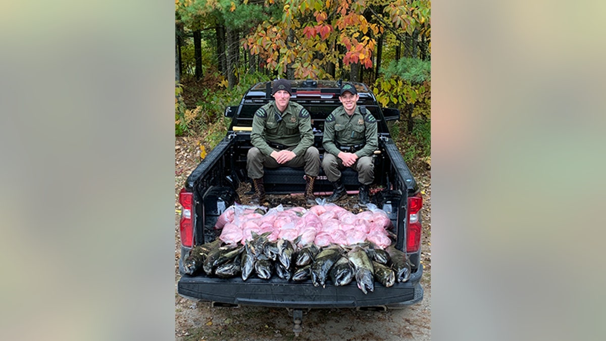 Michigan Department of Natural Resources Conservation Officers Scott MacNeill and Josiah Killingbeck