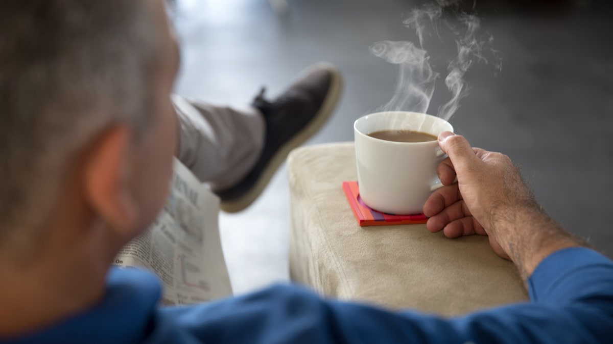 Man drinking coffee