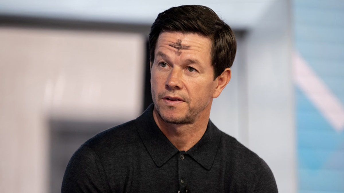 mark wahlberg with ash on forehead