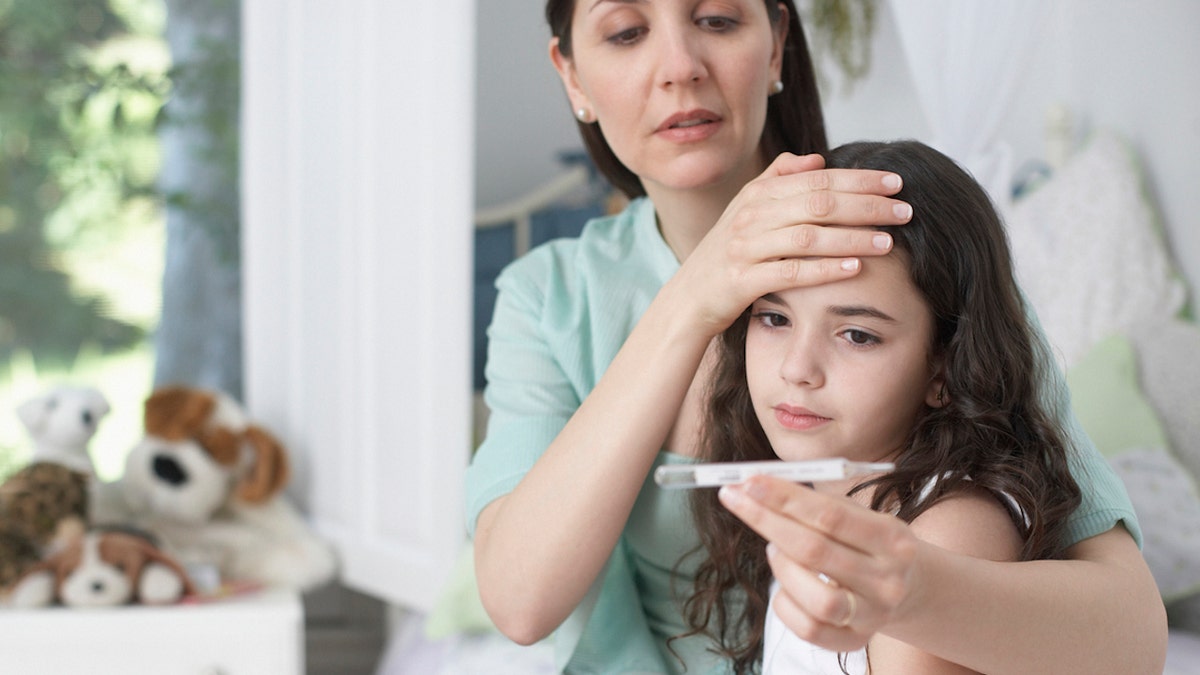 Woman with sick daughter