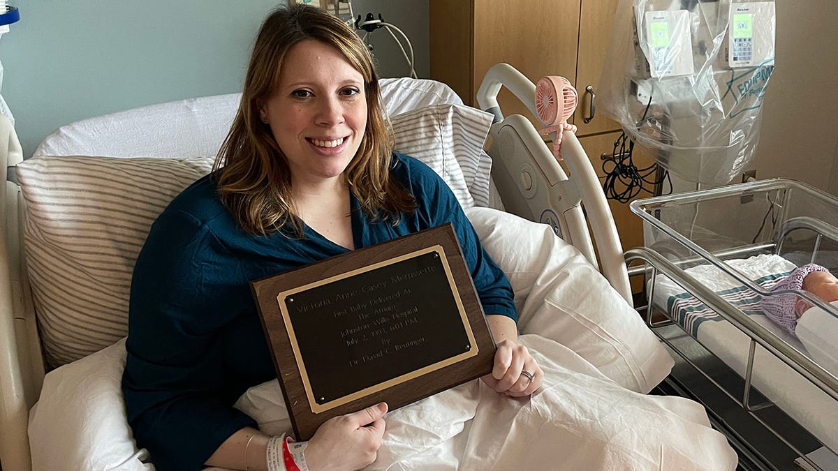 VA mom with plaque