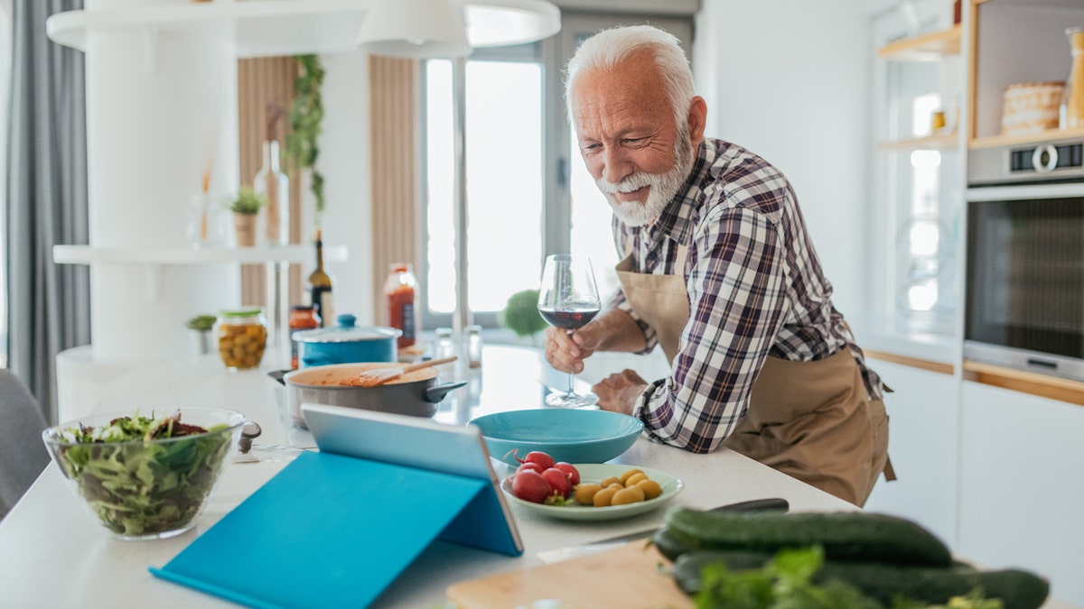 Older man cooking