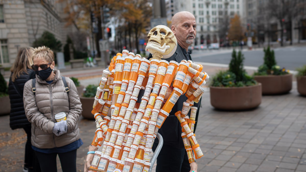 Skeleton made of oxycontin bottles