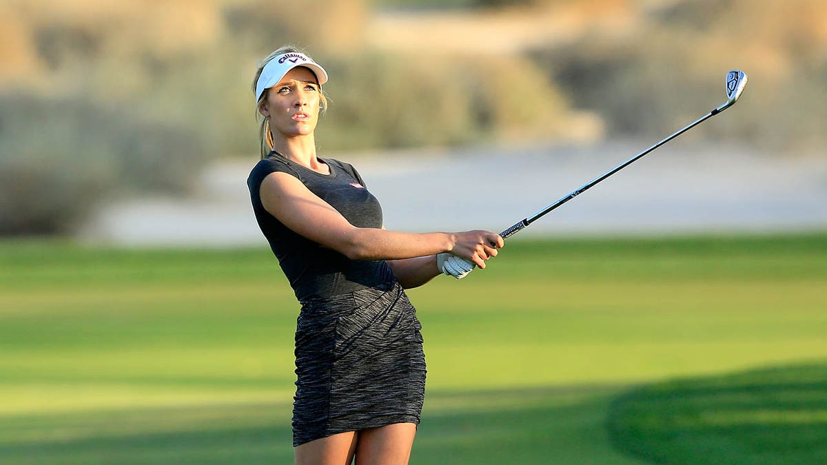 Paige Spiranac swinging