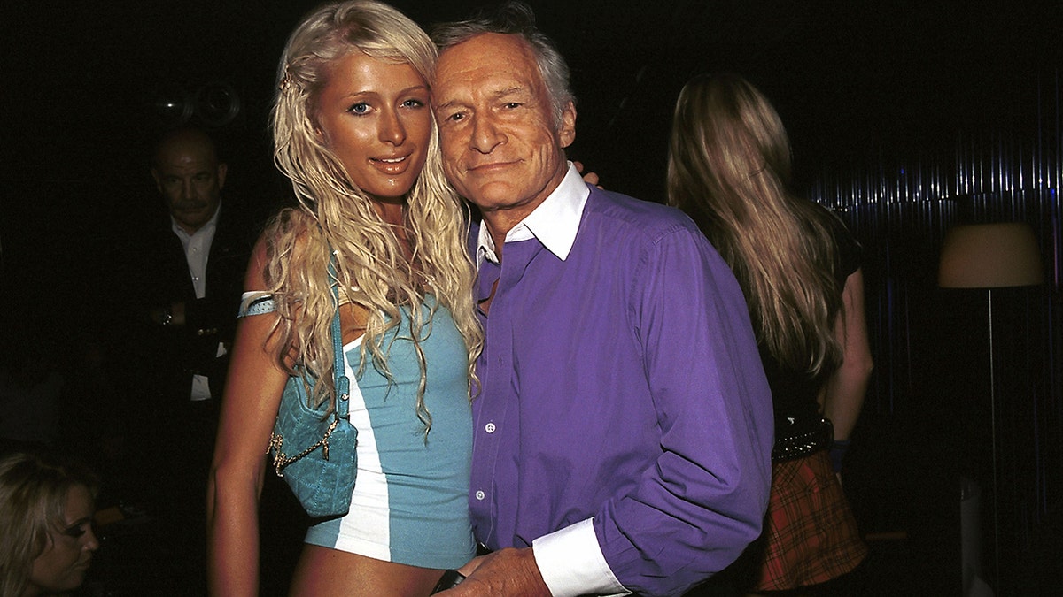 Paris Hilton Hugh Hefner at Hollywood event