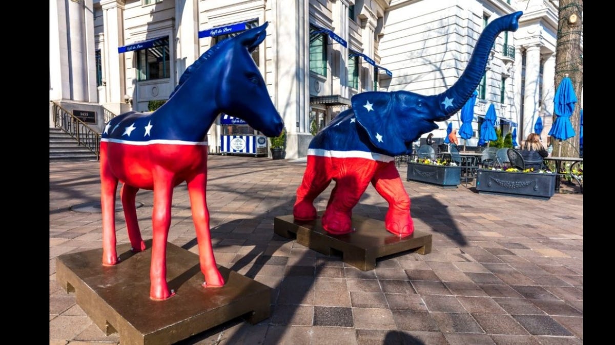 Democratic donkey and Republican elephant statues symbolize America's two-party political system in front of the Willard Hotel in Washington, D.C.
