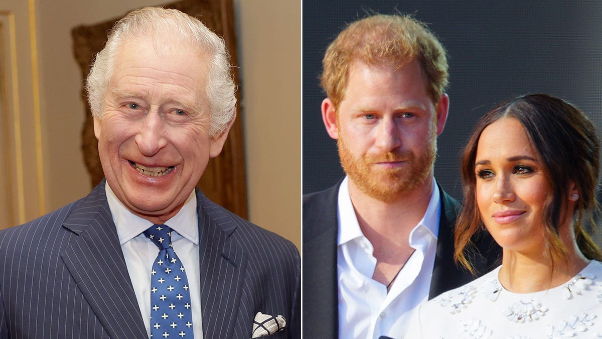 King Charles smiles alongside an image of Prince Harry and Meghan Markle