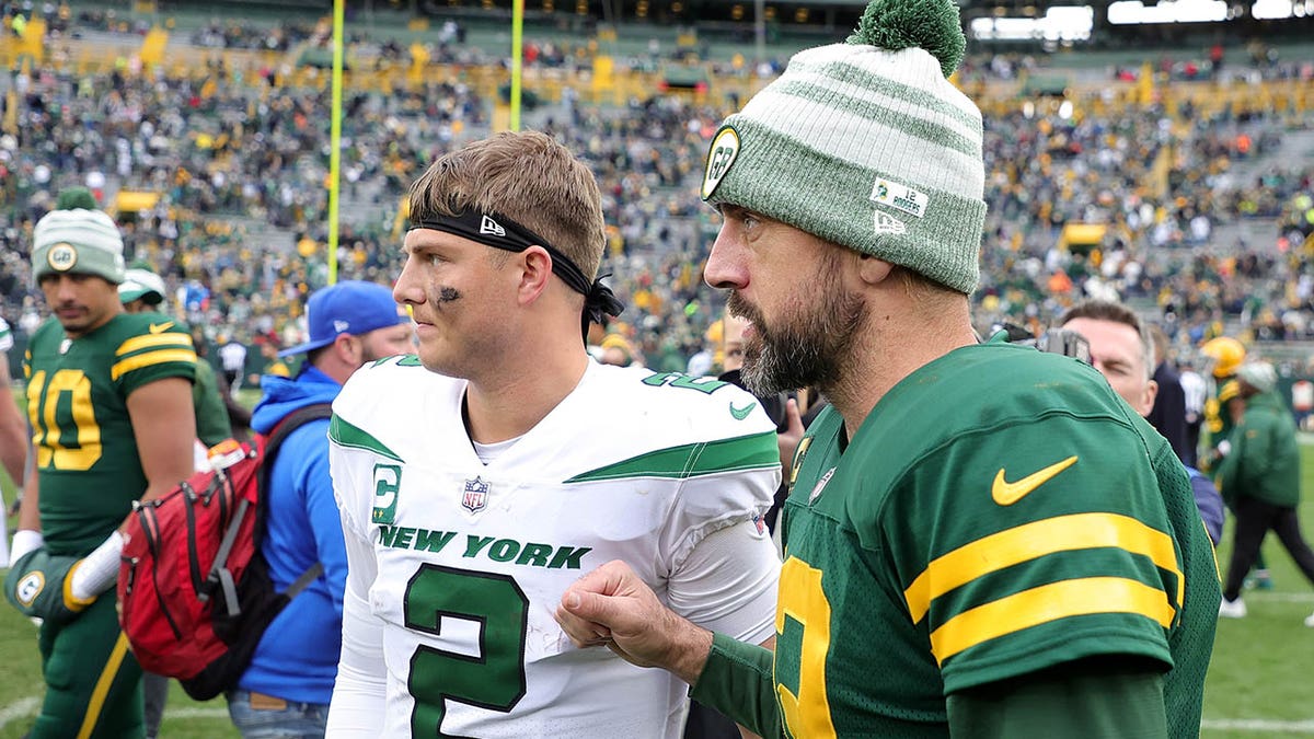 Zach Wilson and Aaron Rodgers