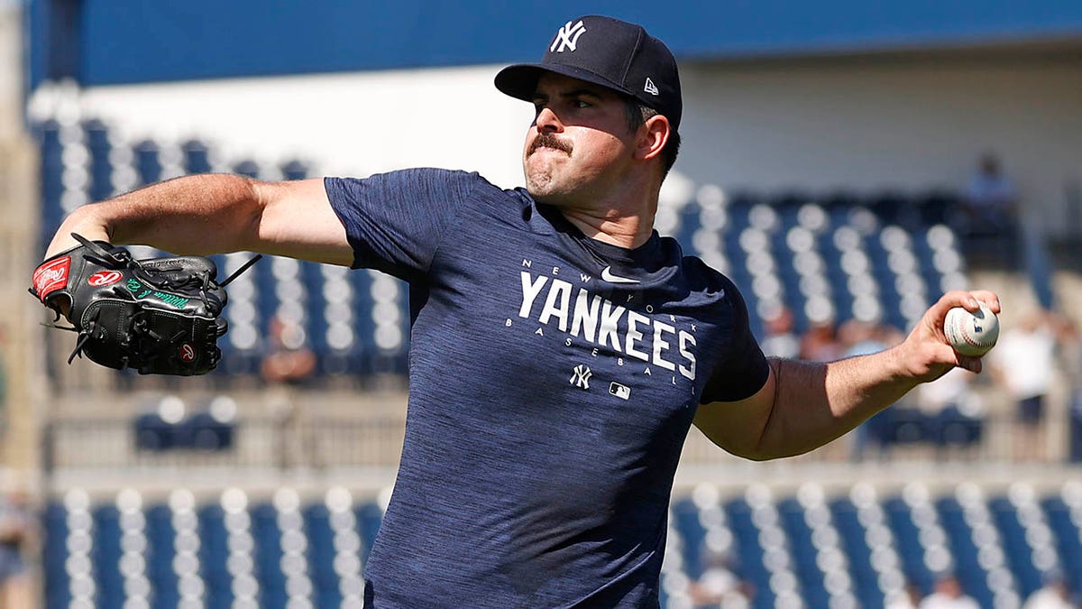 Carlos Rodon throwing