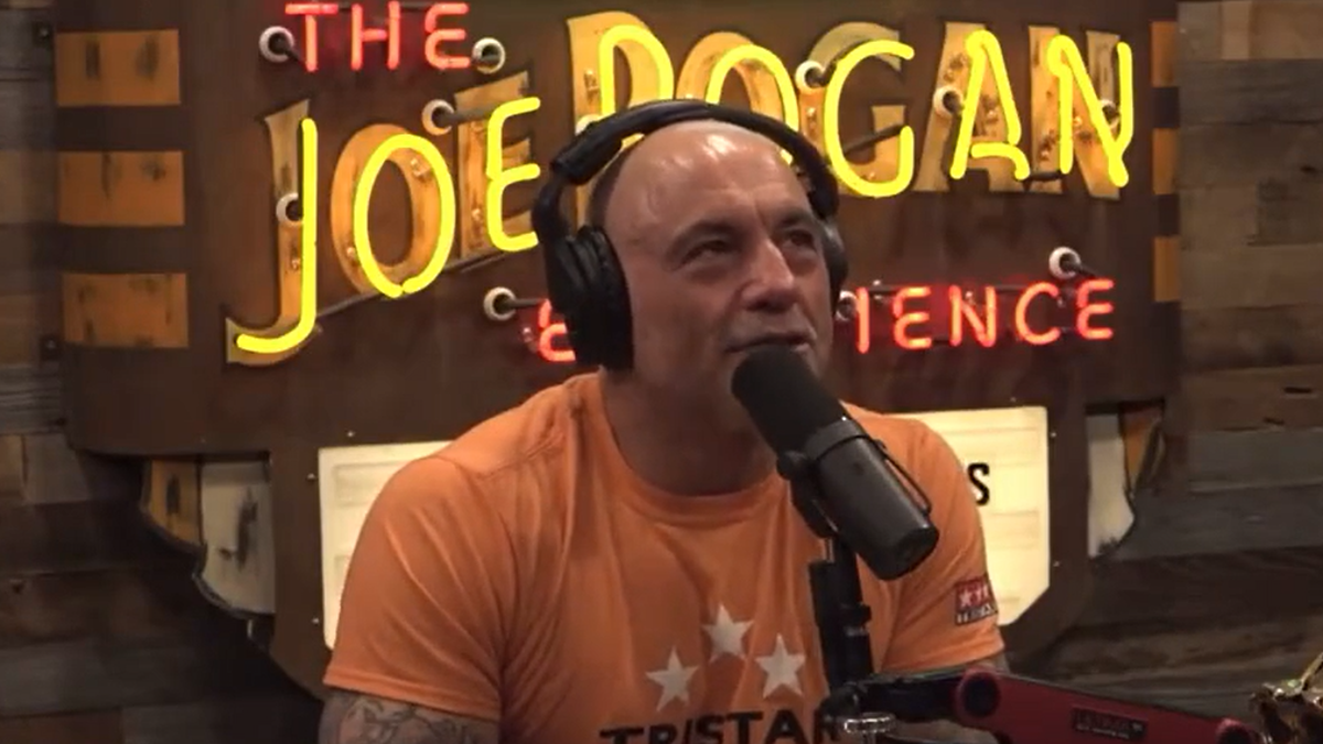 The eponymous host of The Joe Rogan Experience podcast on Spotify jokes with his guest about how advocating for free speech is demonized in modern politics.