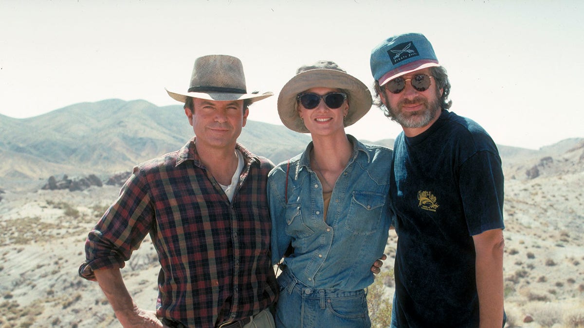 Sam Neill with Steven Spielberg and Laura Dern on the set of "Jurassic Park"