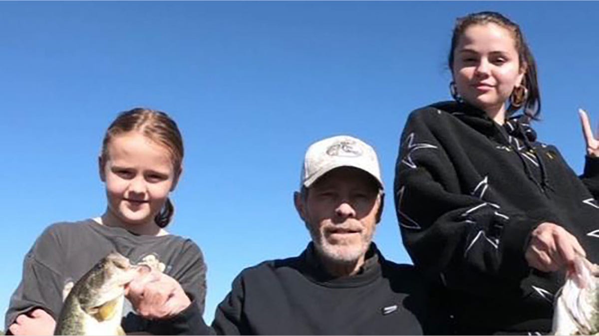 Selena Gomez fishing with her stepdad and her sister