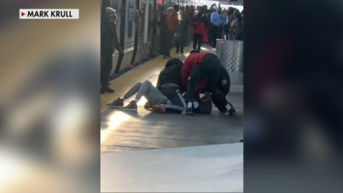 SEPTA passengers holding suspect down