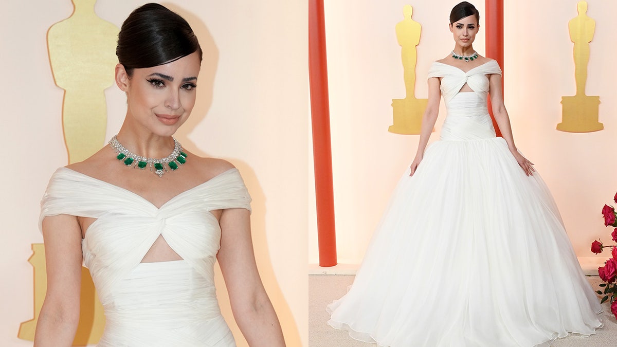 Sofia Carson stunned in an extravagant princess ball gown with emerald necklace