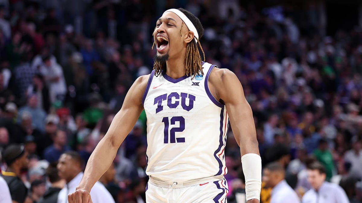 Xavier Cook celebrates