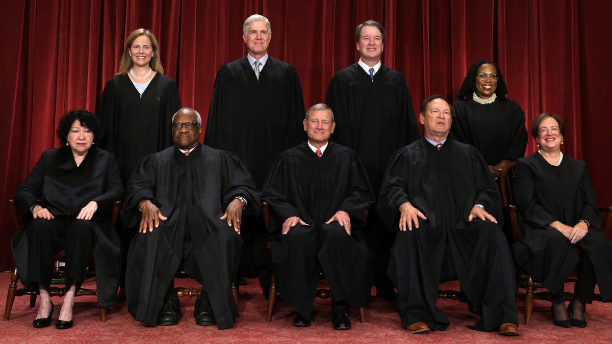 United States Supreme Court (front row left and right) Associate Justice Sonia Sotomayor, Associate Justice Clarence Thomas, Chief Justice John Roberts, Associate Justice Samuel Alito, Associate Justice Elena Kagan, (back row left and right) Associate Justice Amy Coney Barrett , Associate Justices Neil Gorsuch, Brett Kavanaugh, and Ketanji Brown Jackson pose for official portraits.