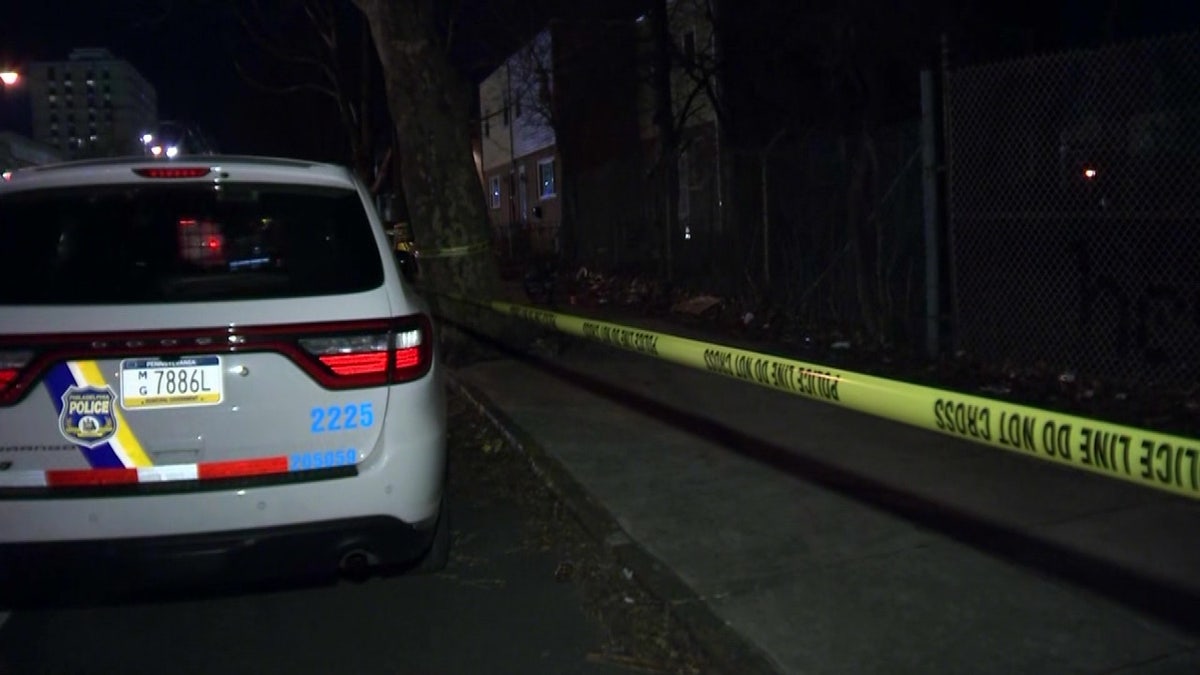 Philadelphia police cars at scene