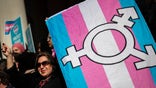 Trans activist with flag