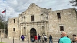 Tourists gather in front of the chapel of the Alamo Mission, known as the "Shrine of Texas Liberty", in downtown San Antonio Texas, on January 23, 2023. (Photo by Daniel SLIM / AFP) (Photo by DANIEL SLIM/AFP via Getty Images)