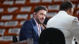 Mike Greenberg looking on before an NBA playoff game