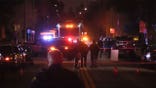 Police officers and units on the street.