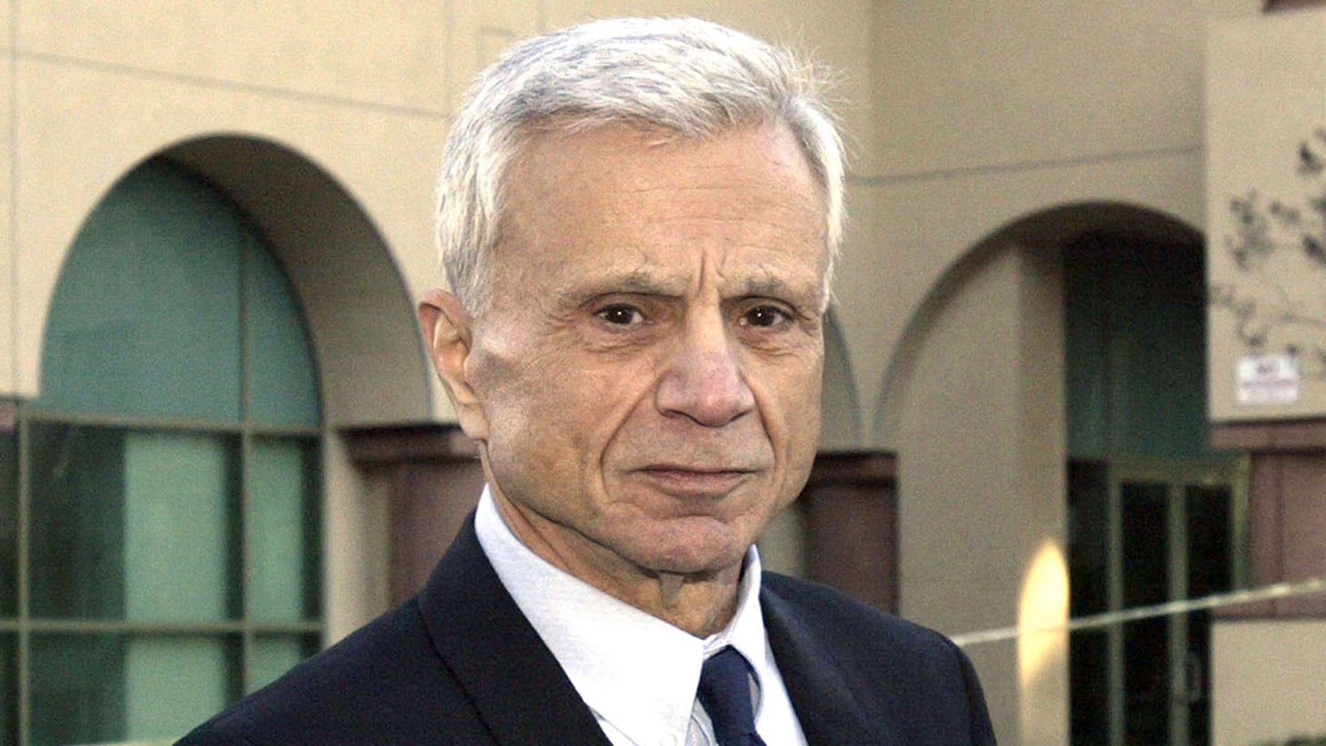 Robert Blake wears suit and tie