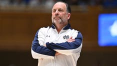 Notre Dame's Mike Brey throws one back after coaching final home game with team