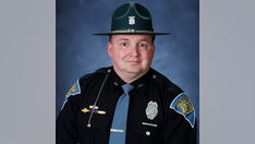 Indiana State Police trooper dies after being struck by suspect in pursuit on interstate
