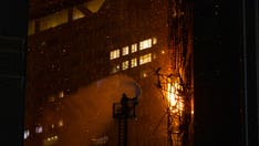 Residents evacuated, neighboring buildings consumed by Hong Kong skyscraper fire