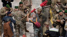 Tear gas, violent clashes unravel as Lebanese protesters try to storm government headquarters in Beirut