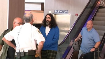 Sheriff greets man accused of making threat against him