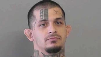 Father defends terrified family with machete after home intruder breaks through window in middle of night