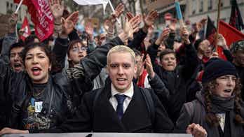 French protestors stage another round of strikes as committee of senators, lawmakers examine pension bill