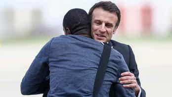 French President Emmanuel Macron welcomes home journalist who was held hostage by extremists