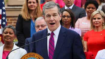 North Carolina Gov. Roy Cooper signs Medicaid expansion law giving Democrats legacy-setting victory