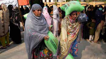 Pakistan boosts security after 11 people killed in stampedes at wheat distribution centers