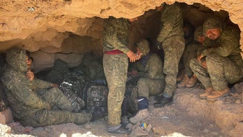 Border child smugglers caught, air ops nabs three dozen illegal immigrants in camouflage hiding in remote cave