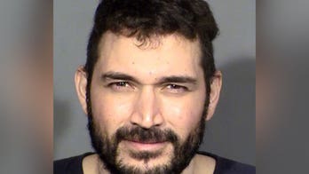 Las Vegas man arrested for allegedly smashing car with ax, while child sat inside: report