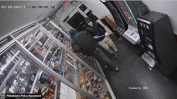 Philadelphia ax-wielding robbery suspects leave convenience store empty-handed after failing to chop open ATM