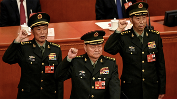 China's new defense minister was previously sanctioned by US for buying military equipment from Russia