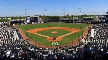 Yankees fan acts like outfielder, runs pole to pole at spring training game in hopes of catching home run ball
