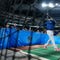 Team USA players watch in awe as MLB-great Ken Griffey Jr. takes batting practice at World Baseball Classic