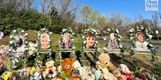 Memorials for the six victims who were killed in a mass shooting are placed outside of The Covenant School