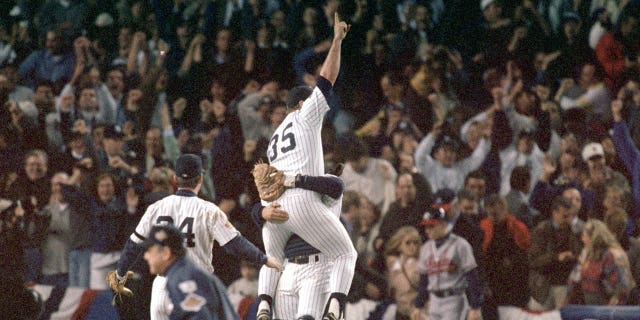 John Wetteland (35) of the New York Yankees celebrates the final out of Game 6 of the 1996 World Series against the Atlanta Braves at Yankee Stadium on October 26, 1996, in the Bronx, New York.