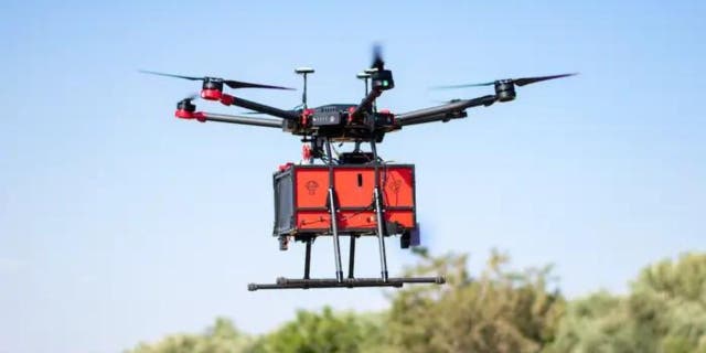 Flytrex drone delivering an item